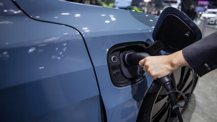 Fototapeta premium Charging the electric car battery