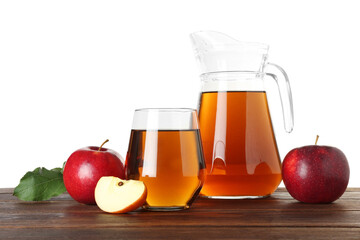 Tasty apple juice in glass, jug and fresh fruits on wooden table against white background