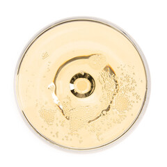 Champagne in glass isolated on white, top view