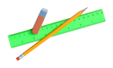 Ruler, pencil and eraser isolated on white, top view