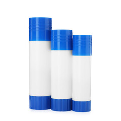 Many different glue sticks isolated on white