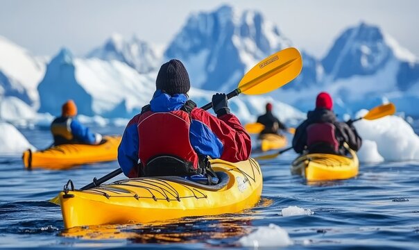 winter kayaking in Antarctica, extreme sport adventure, people paddling on kayak near iceberg