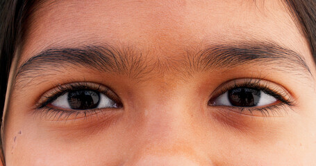 Optometry, closeup and eyes of child for optical, care and eyesight improvement for healthcare. Ophthalmology, face and portrait of young girl kid with vision wellness awareness for visual lens.