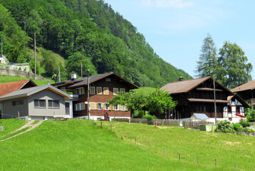 Traditional rural architecture and family livestock farms on the shores of Lake Lungern - Canton of Obwald, Switzerland (Traditionelle Architektur am Ufer des Lungernsees - Schweiz)