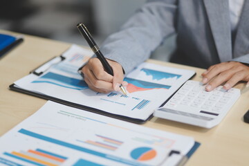 Business Documents, Auditor businesswoman checking searching document legal prepare paperwork or report for analysis TAX time,accountant Documents data contract partner deal in workplace office