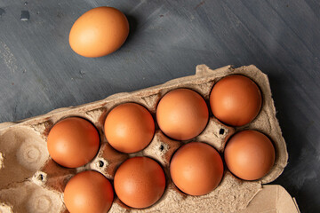 Brown organic eggs in a box