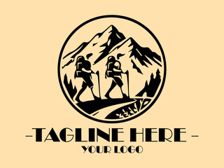 Obraz premium Two hikers hike through mountains at sunset, with backpacks. Adventure, travel, nature, exploration, hiking, outdoors, vacation, and backpacking themes