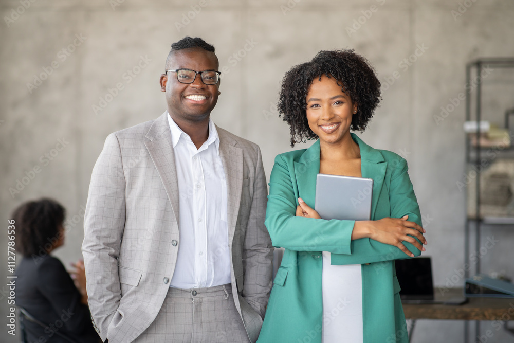 Poster a diverse group of professionals engages in teamwork within a contemporary office environment. two s