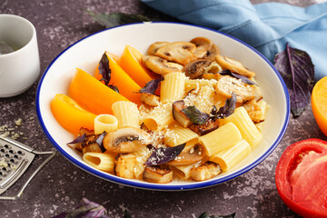 Plate with delicious Italian pasta salad on table