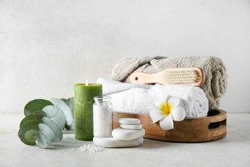 Set for spa treatment on light background