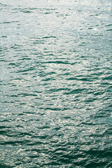 Deep blue sea texture background. Background of aqua sea water surface. Blue sea surface. Aqua water surface. Blue ocean water texture background. Surface of sea.