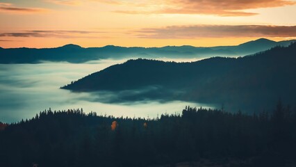 Golden hour sunrise illuminating foggy mountain ranges in the carpathian mountains, ukraine,...