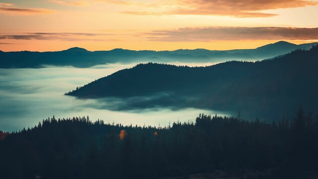 Golden hour sunrise illuminating foggy mountain ranges in the carpathian mountains, ukraine, creating a breathtaking natural spectacle