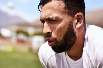 Man, rugby and sweat on match at field tired for sports game, tournament and competition in New Zealand. Male person, stadium and exhausted as player or athlete on half time, workout and training