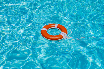 Safety equipment, Life buoy or rescue buoy floating on sea to rescue. Help in water concept....