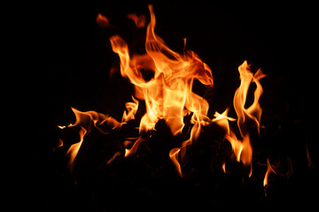 Texture of fire on black background. Abstract fire flame background. Large burning fire. Blaze fire...