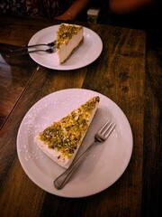 piece of pistachio lemon cheesecake