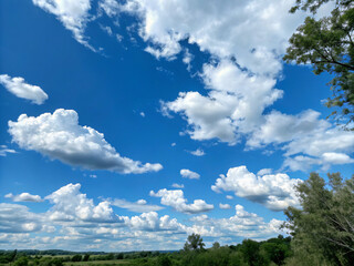 field and blue sky. sky, blue, cloud, clouds, nature, day, weather, white, cloudscape, air, cloudy, summer, light, cumulus, heaven, atmosphere, fluffy, beautiful, space, sunlight, clear, outdoors, sun