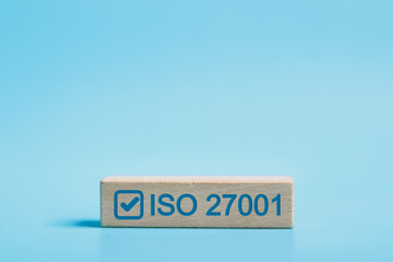 ISO 27001 concept. requirements, certification, management, standards. Wooden block with ISO 27001...