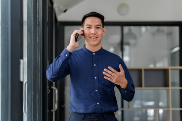 Professional man engaging in business call modern office portrait bright environment casual view corporate communication