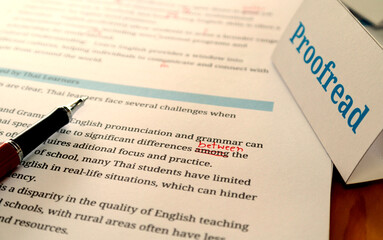 English article being proofread in office