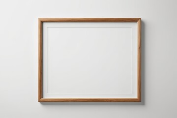 blank wooden picture frame on wall with white background