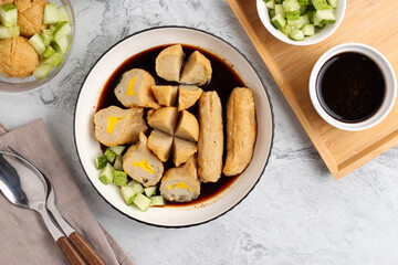 Pempek or Indonesian fish cake. Made from fish and flour. served with cuko. originated from palembang, sumatera. Perfect for recipe, article, catalogue, photo illustration, or any commercial purposes.