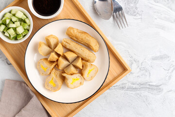 Pempek or Indonesian fish cake. Made from fish and flour. served with cuko. originated from palembang, sumatera. Perfect for recipe, article, catalogue, photo illustration, or any commercial purposes.