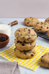 A stack of chocolate soft cookies. Perfect for catalogue, photo illustration, article, recipe or any commercial purposes.