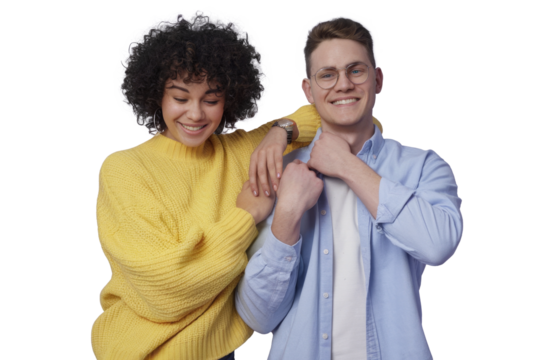 Mixed race partners give fist bump, agree to work together, have happy facial expressions rejoice success and cooperation, have toothy smiles, isolated over purple background. Team work concept