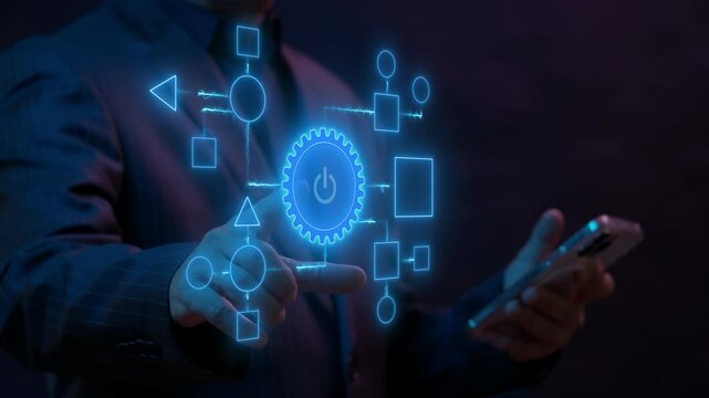 Business process and workflow automation with flowchart. Business and technology concept. Businessman push on power button to shows arranging processing management on virtual screen.
