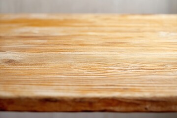 Close-up of a textured wooden table surface.