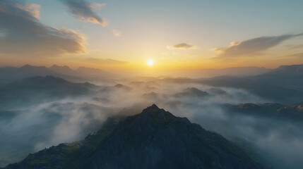 breathtaking sunrise over serene mountain landscapes with mist
