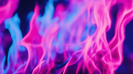 Bright blue and purple flames flicker against a dark backdrop, creating a mesmerizing display of color and movement in the darkness