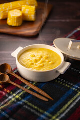 Delicious corn soup on the table.
Tasty corn soup image.
