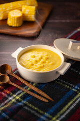Delicious corn soup on the table.
Tasty corn soup image.
