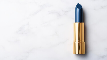 Luxurious blue lipstick in gold tube on marble surface, elegant and stylish