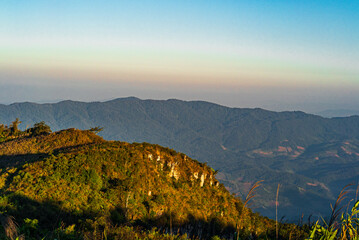 Mountainous landscape under a clear sky in morning at Chiang Rai, Thailand