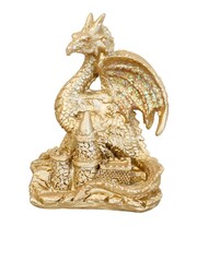 A gold dragon sits on a castle