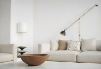 Obraz premium A modern, minimalist living room with a white sofa, a wooden bowl on a side table, and a floor lamp in the daytime with clear skies in the background.