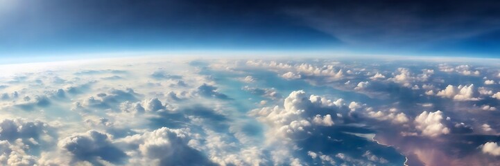 Panoramic High-Altitude Landscape Showcasing Earth's Curvature, Fluffy White Clouds, and Vibrant Blue Sky