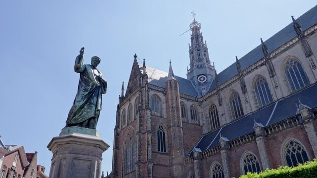 Statue of Laurens Janszoon Coster by Grote Kerk church cathedral