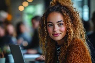 Diverse university students collaborating on laptop at modern table in library - Young professionals engaging in group study session - Youth teamwork in academic setting