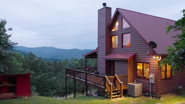A cabin in Ellijay, Georgia during the summer overlooking the forest.