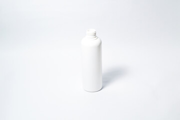White plastic bottle on isolated white background