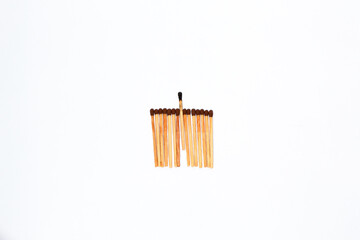 Wooden match sticks on isolated white background