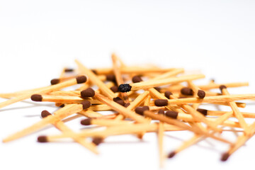 Wooden match sticks on isolated white background