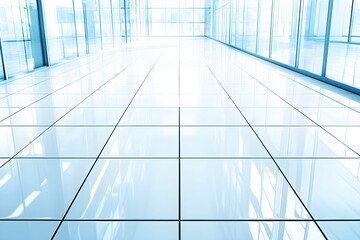Fototapeta premium A bright, modern hallway with glossy white tiles and large glass windows, creating an open and airy atmosphere.