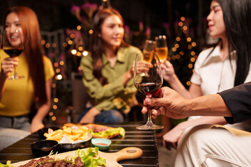 Throw a party Celebrate whiskey at a friendly party in a restaurant. Night.