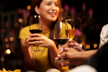 Throw a party Celebrate whiskey at a friendly party in a restaurant. Night.